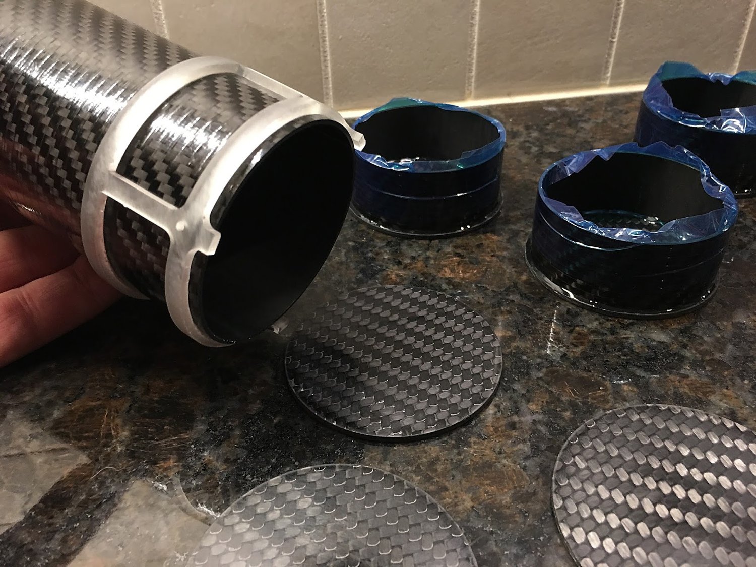 3D printed assembly jig on end of parachute mortar tube; ready for bonding