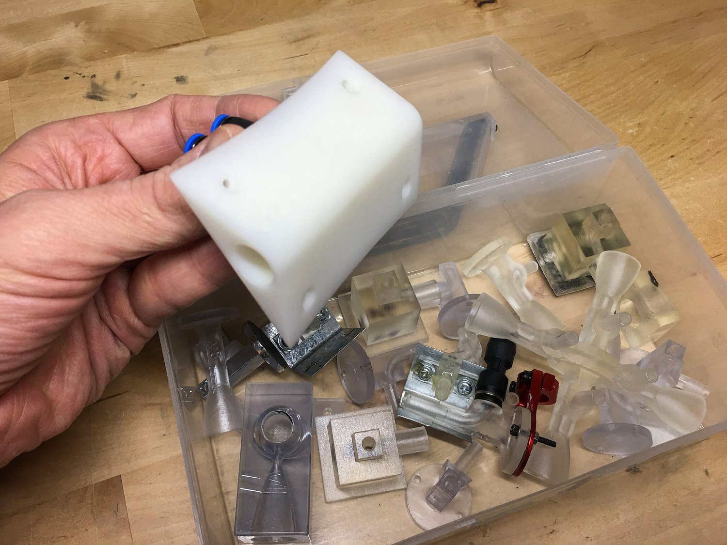 Final design for Z-axis nozzle packs along with several failed iterations. This is what innovation looks like...